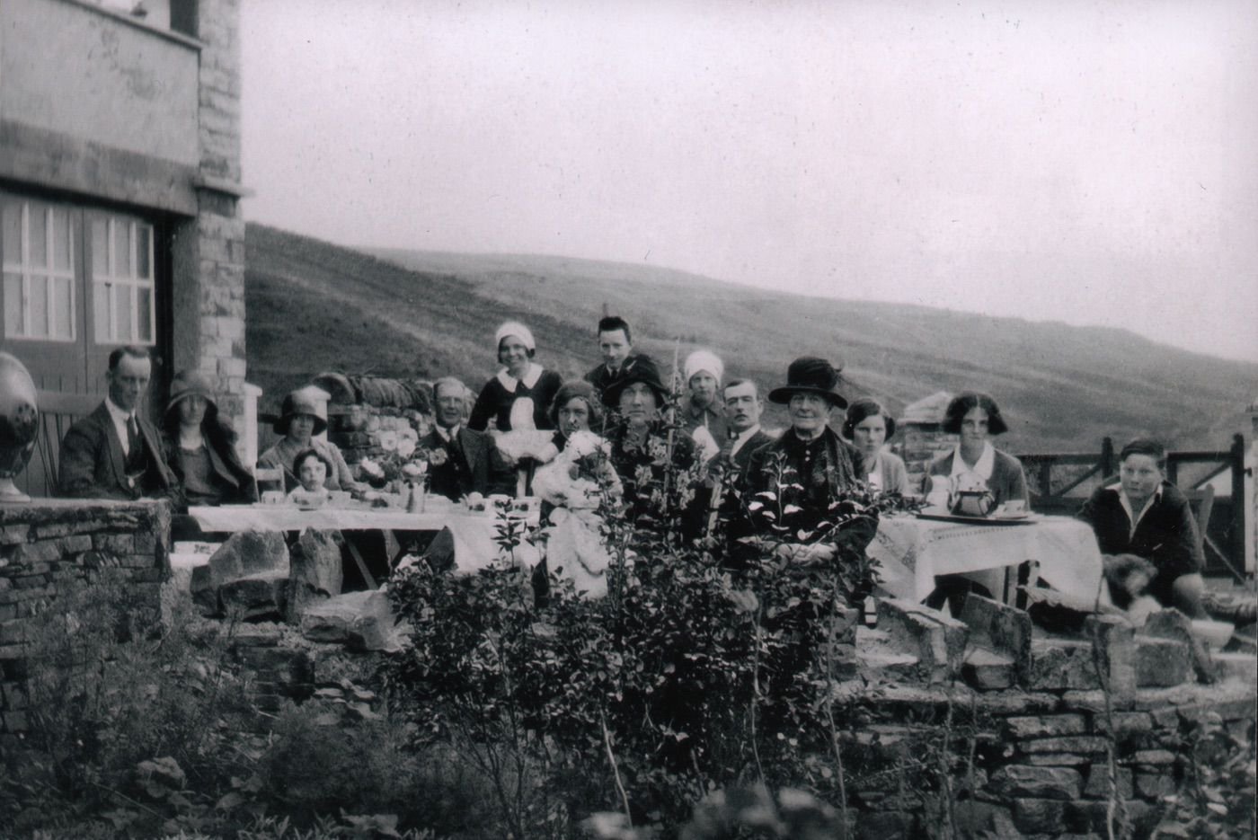 Coll. AMHS. copy print labelled verso: Copyright �
Keith Pritchard. Impossible. The image is clearly over 70 years old and is �-free.An alfresco meal in the ca 1930s at High Hundy Bridge, above Garrigill.
ea party at HundyBridge, Garrigill, 1931. The Adamson family. Fred at far R. They owned Crops Hall & Gatefoot farms - & later added Low Shield Hill.