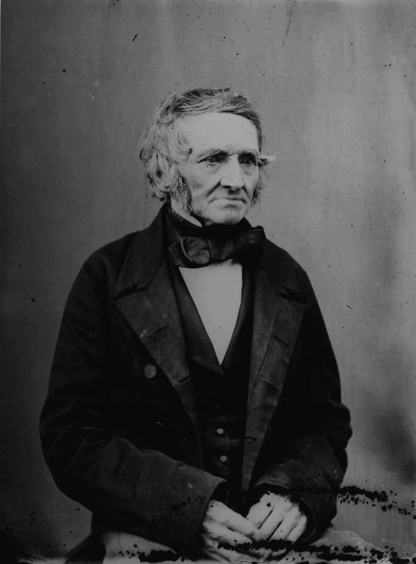 Coll. AMHS. Modern contact print from a probable von Dix & Smedley glass plate. An older man in a frock coat and wearing a full bow tie and side whiskers.